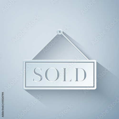 Paper cut Sold icon isolated on grey background. Sold sticker. Sold signboard. Paper art style. Vector Illustration