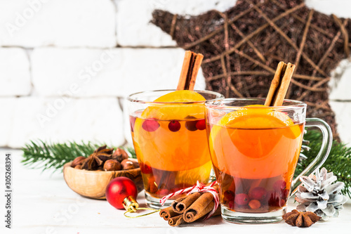 Winter hot tea with orange, cranberry and spices.