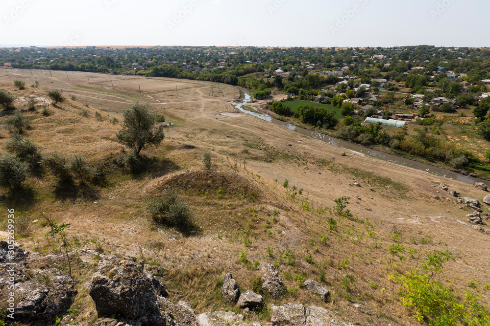 Fototapeta premium River near a village