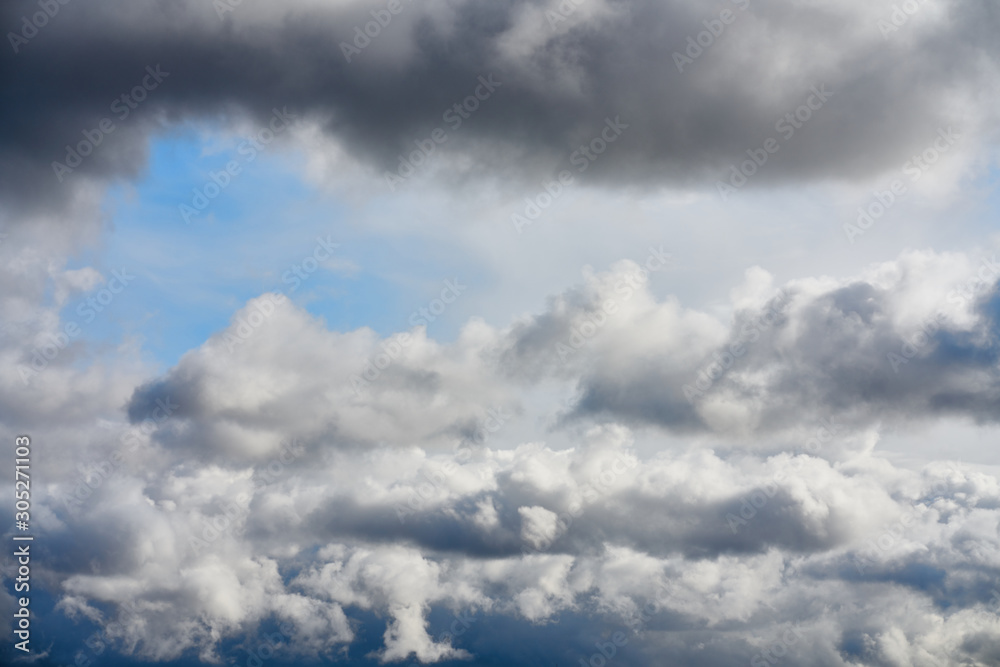 Volumetric clouds in the blue sky. Summer day and blue sky with volumetric clouds.