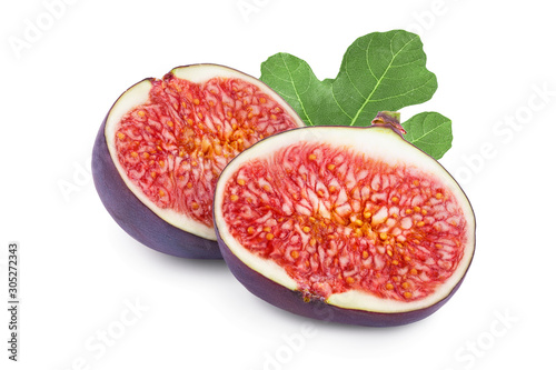 Fresh fig half fruit with leaf isolated on white background
