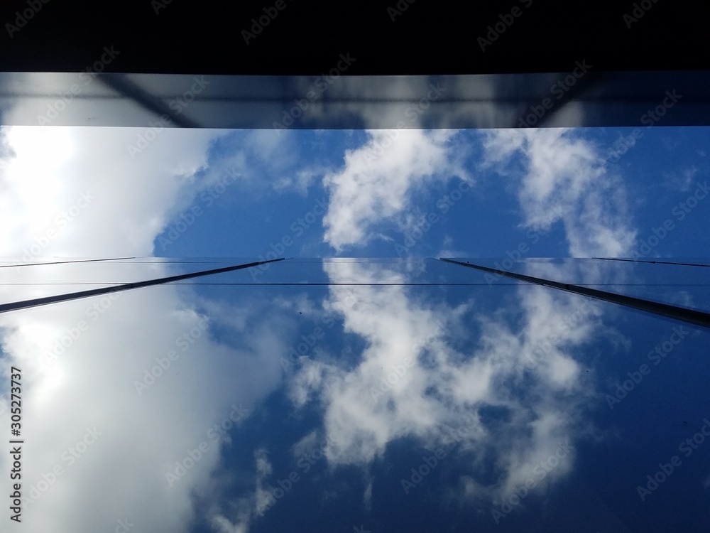 Reflection on skyscraper cloud in the sky