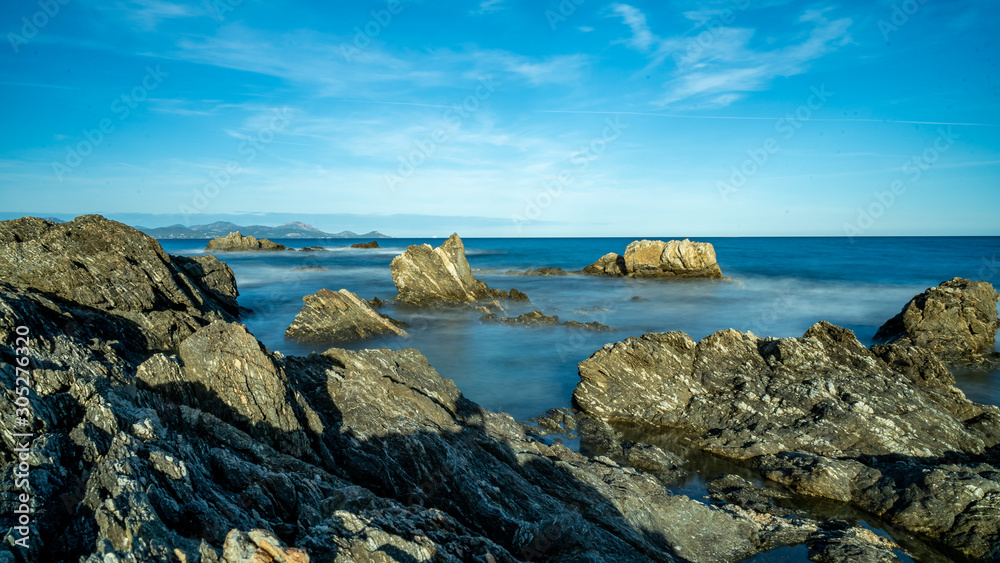 long exposure of rocks at the mediterranean sea near nice