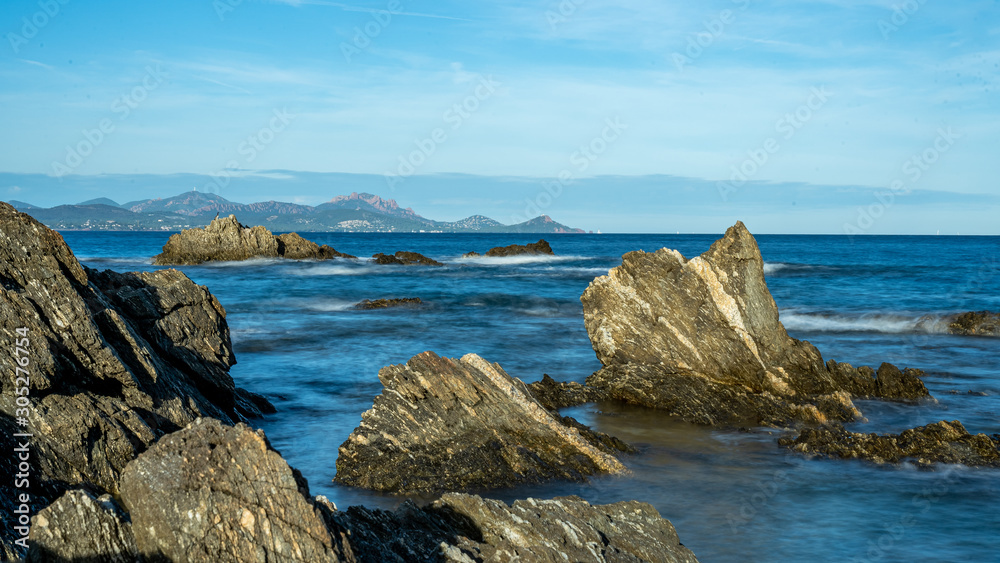 long exposure of rocks at the mediterranean sea near nice long exposure of rocks at the mediterranean sea near nice