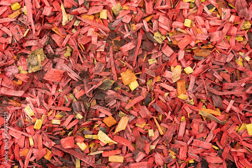 Texture of brightly painted wood shavings