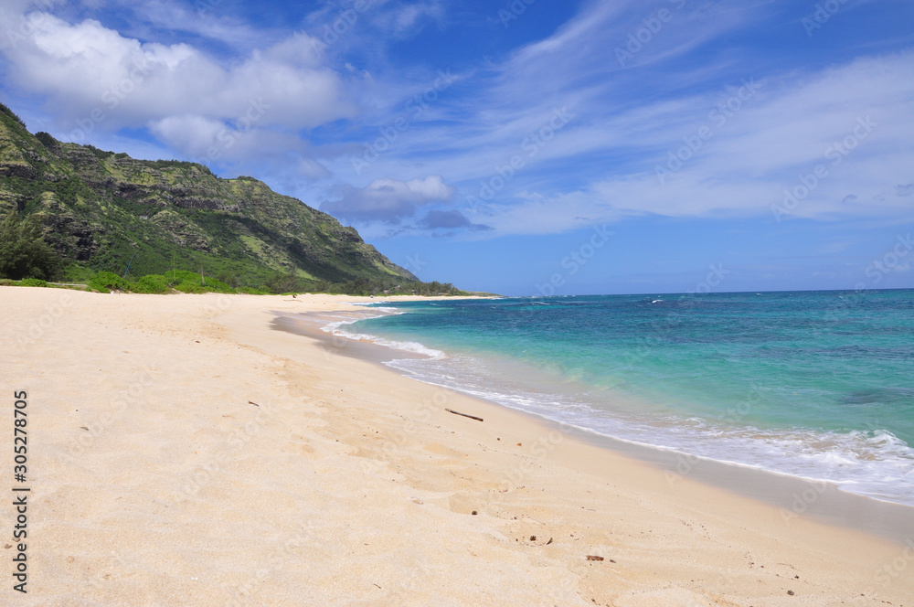 White sandy beach at Mokuleia Beach Park, Kaena Point at the North Shore  on Oahu Island, Hawaii, United States.