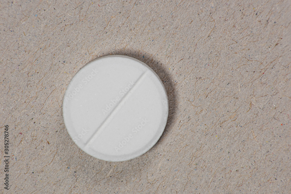 Obraz premium Tablet on craft background from above