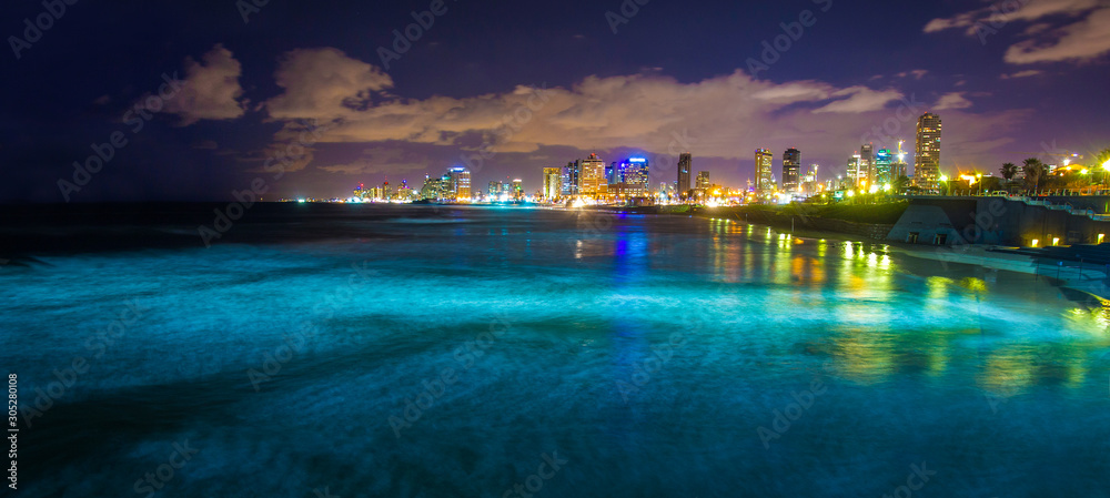 Night city - Tel Aviv  and  blue Mediterranean sea