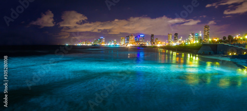 Night city - Tel Aviv  and  blue Mediterranean sea