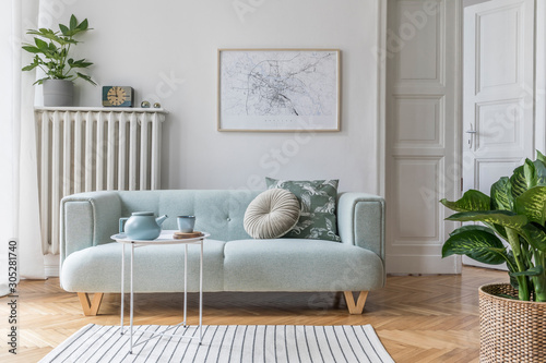 Stylish scandinavian living room interior with design mint sofa, furnitures, mock up poster map, plants, and elegant personal accessories. Home decor. Interior design. Template. Ready to use. 