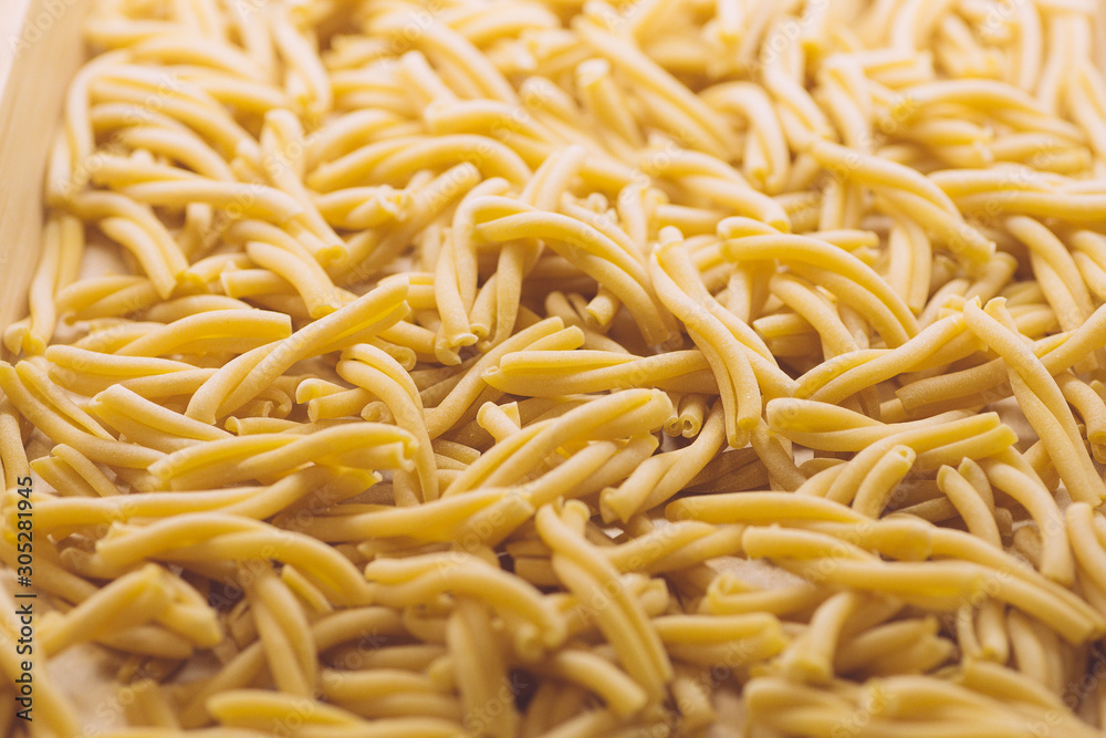 Pasta fresh in classic style on white background. Homemade cooking