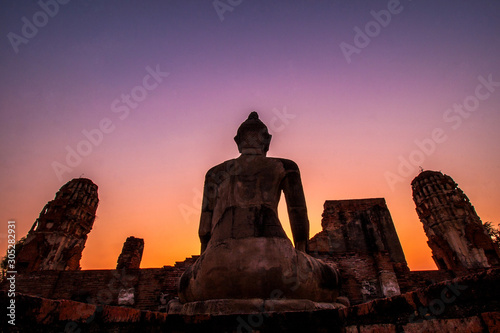 Silhouette Big Buddha Statue Sitting in Sunset at Wat Mahathat Ayutthaya  Thailand