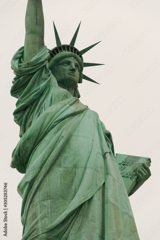 Fototapeta premium Statue of Liberty in New York, portrait. NYC. Goddess.