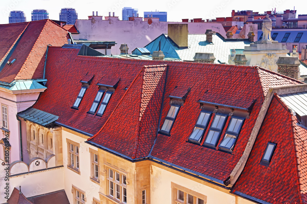 Beautiful view of old vintage building with red roof in old town and the cityscape of Bratislava, Slovakia