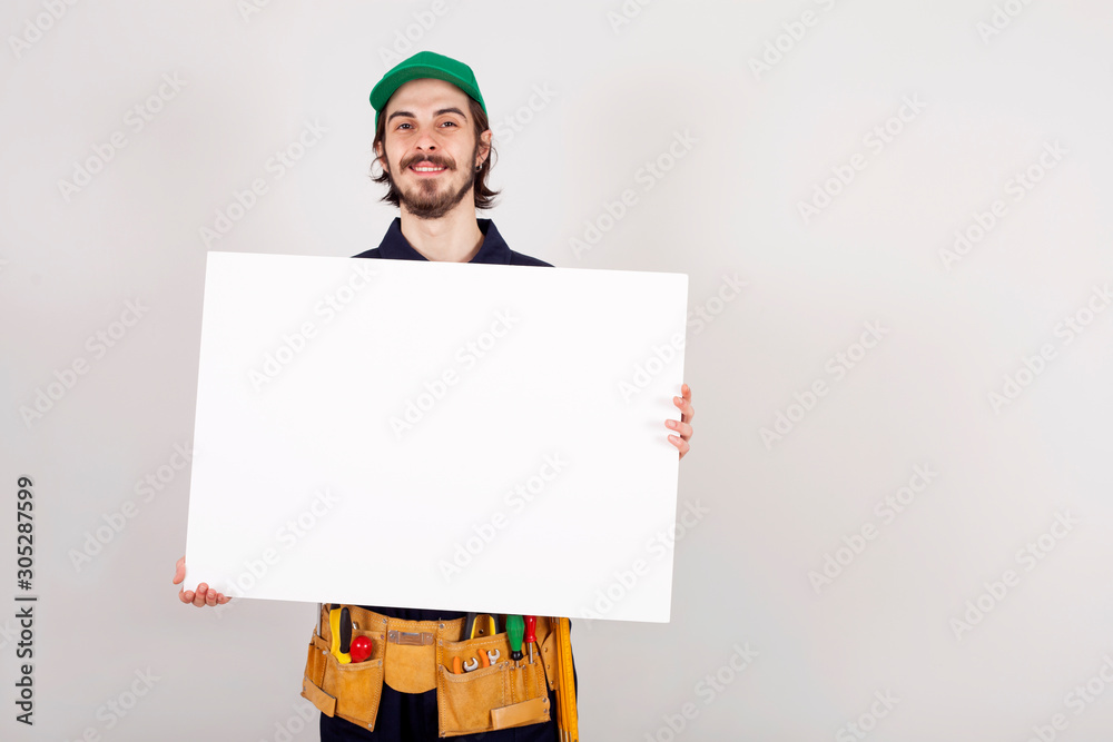 young man with blank board young man with blank board