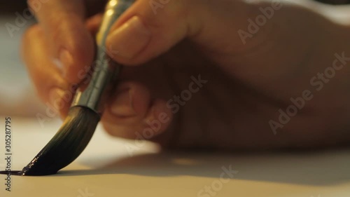Close up of an artist painting