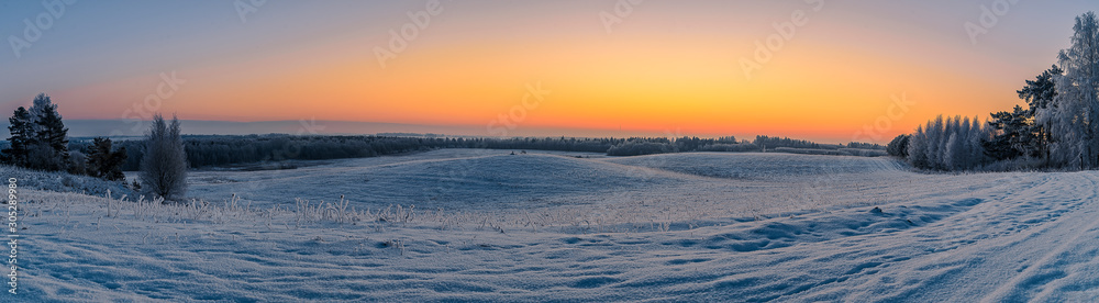 winter sunset in the fields