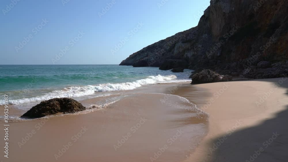 Waves on the beaches and shores of Portugal in the Algarve region Waves on the beaches and shores of Portugal in the Algarve region