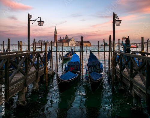 Venetian gondolas. Postcard views of old Venice. Venetian embankments. The romance of old Venice. Italy. © Svetlana