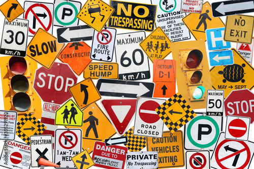 A collection of traffic, caution, driving and street signs montage with White Background. photo