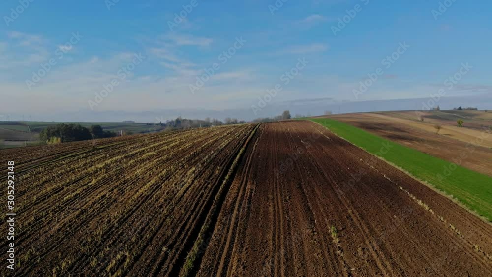 A flight over cultivated fields in the light of the autumn sun. A flight over cultivated fields in the light of the autumn sun.