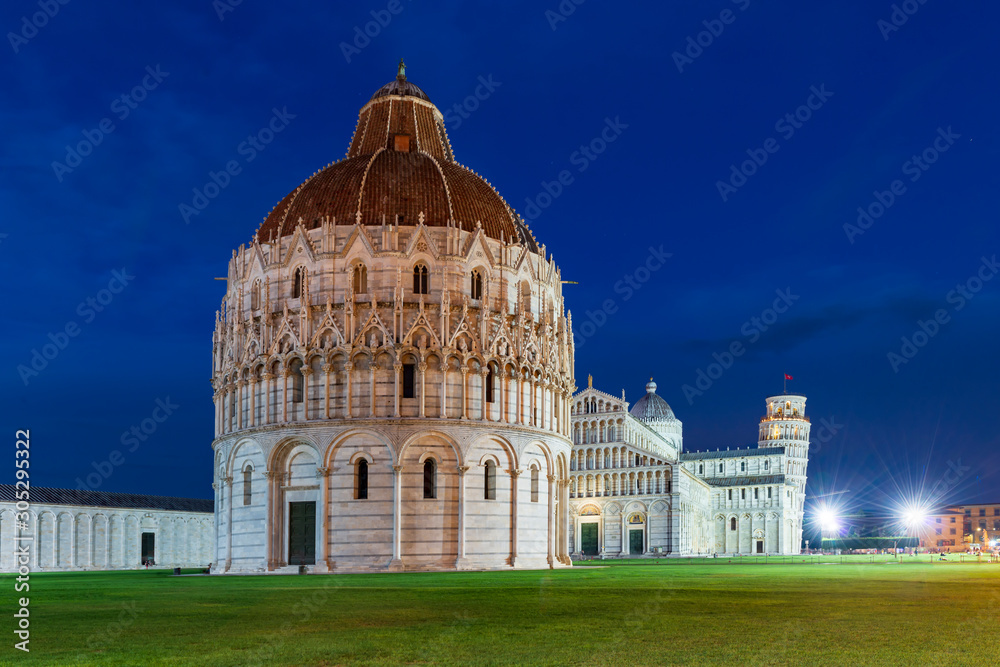 World heritage Pisa baptistery, tower and cathedral at night.
