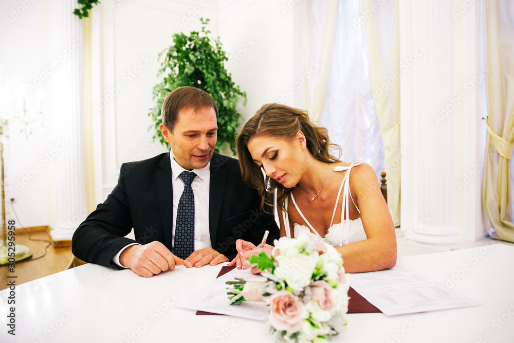 newlyweds in the registry office newlyweds in the registry office