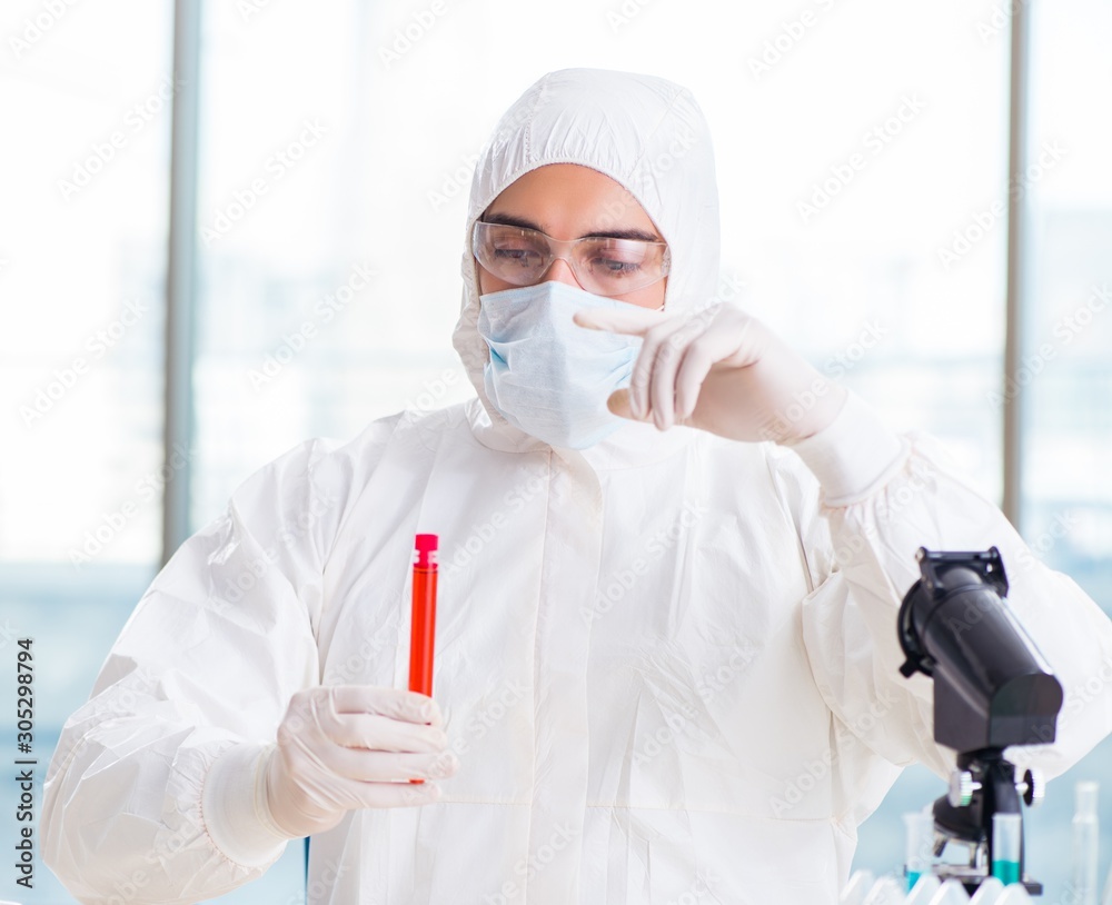 Male chemist working in lab Male chemist working in lab