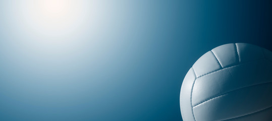 White leather volleyball detail on blue background
