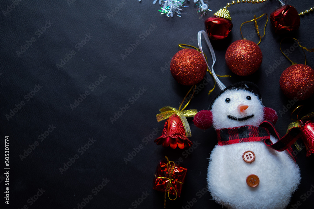 Fototapeta premium Decorative Christmas and snowman isolated on black background