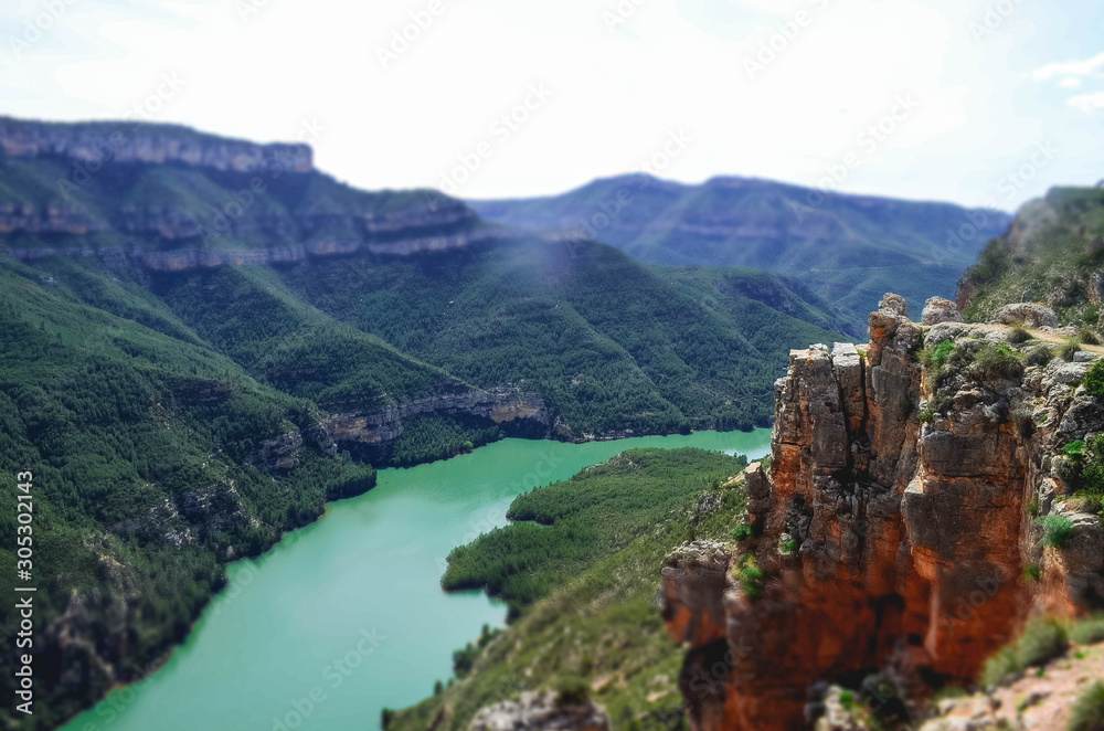 River on Cliff with Mountain