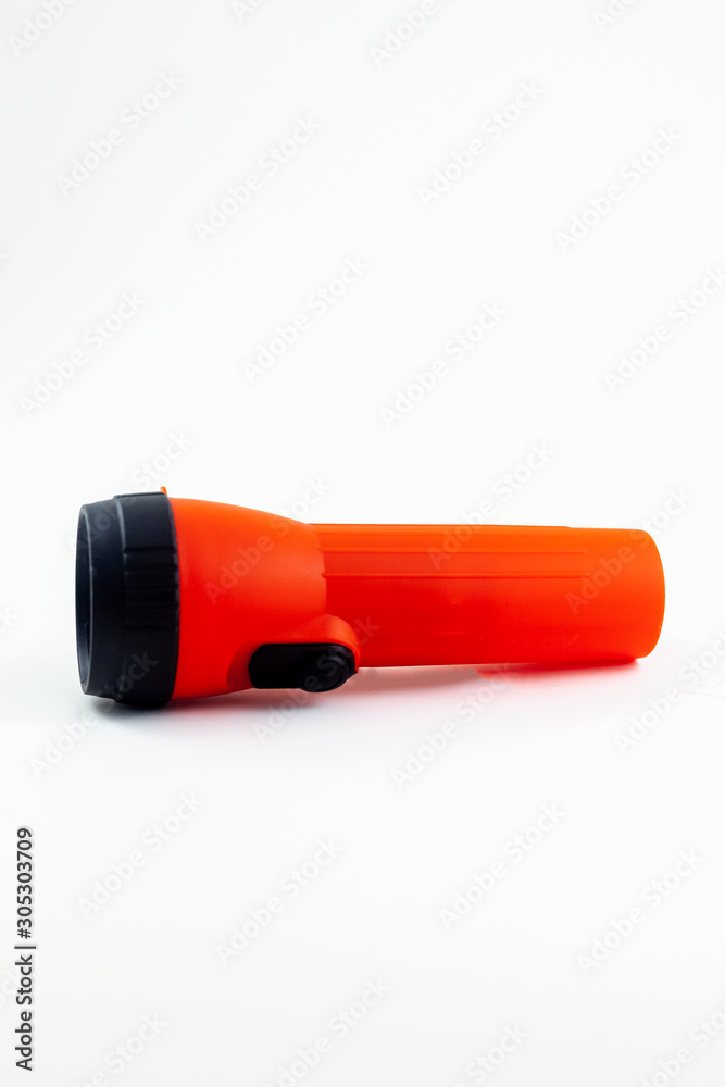 Red flashlight on white background Red flashlight on white background