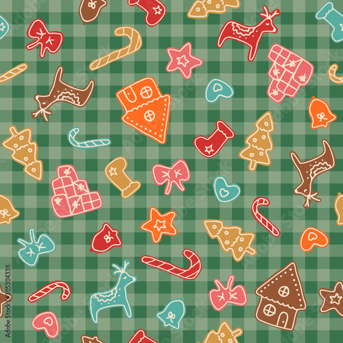 Christmas decorations and gingerbread cookies in a classic checked pattern in dark green. Colorful, cute hand-drawn illustration with a touch of vintage design