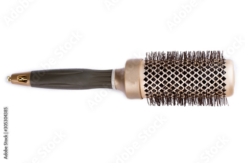 Round hairbrush with bristle. Salon round hairbrush isolated on white background.