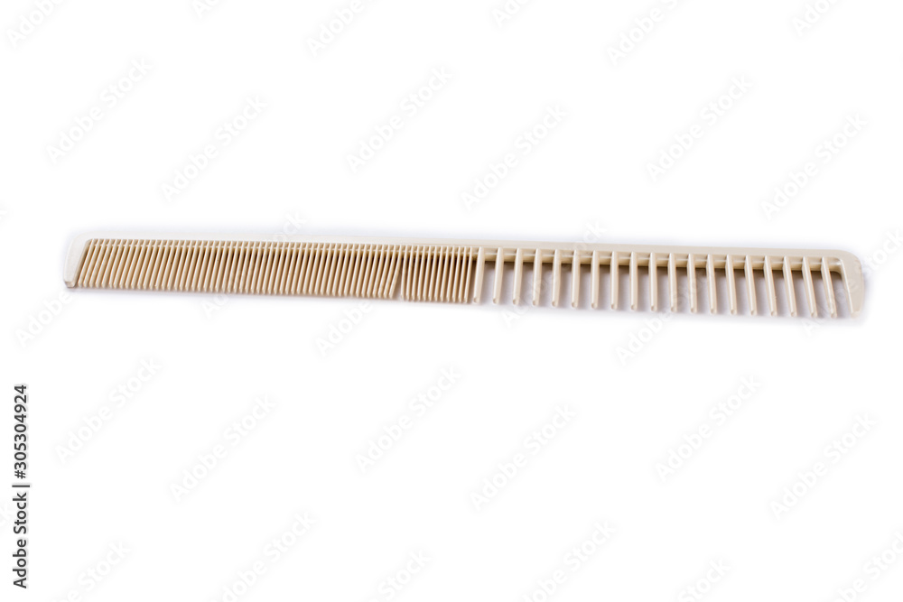 Hair comb isolated on white background. Plastic hair brush. Space for text. Hair comb isolated on white background. Plastic hair brush. Space for text.