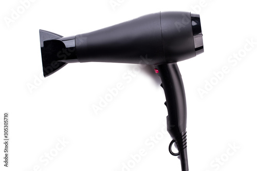 Hair dryer isolated on white background. Electric hair dryer. Space for text.