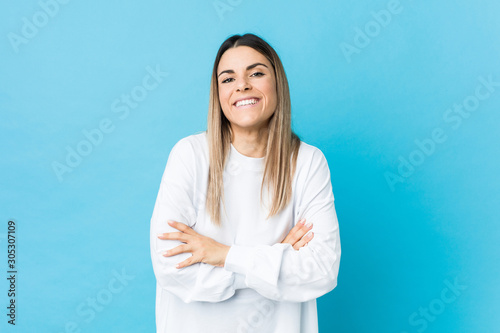 Young caucasian woman isolated laughing and having fun. © Asier