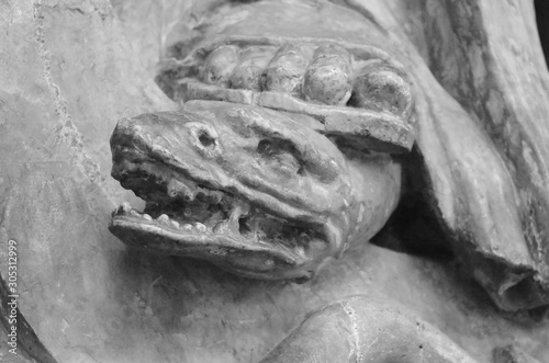 Snake Statue trodden in Church