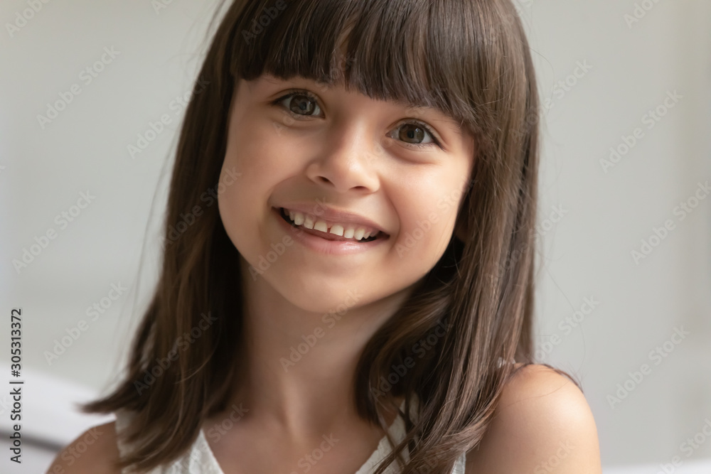 Closeup portrait of beautiful brown haired seven years old girl Closeup portrait of beautiful brown haired seven years old girl