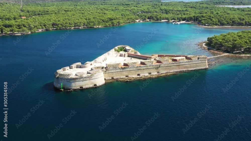 Saint Nicholas fortress at Sibenik bay entrance, Dalmatia, Croatia, drone aerial shot of beautiful blue coastline seascape Saint Nicholas fortress at Sibenik bay entrance, Dalmatia, Croatia, drone aerial shot of beautiful blue coastline seascape