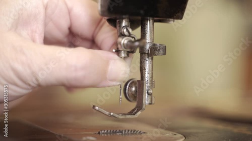 Placing Needle on Old Sweing Machine Needle Clamp