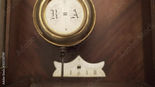 Pendulum Tip of Old Wall Clock