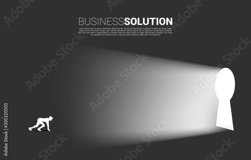 silhouette of businessman ready to run out to key hole door. Find the solution concept vision mission and goal of business