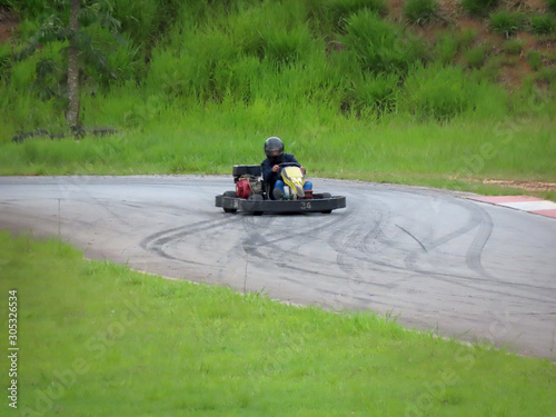 Kart race. Riders driving Kart