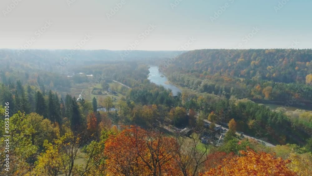 River and Forest in Autumn Sigulda city nature, Gauya, 4K drone flight, bridge car drive from above River and Forest in Autumn Sigulda city nature, Gauya, 4K drone flight, bridge car drive from above
