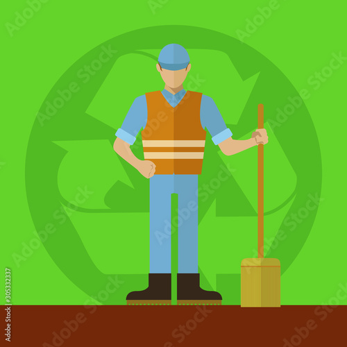 Sanitation worker with broom in front of a recycling sign