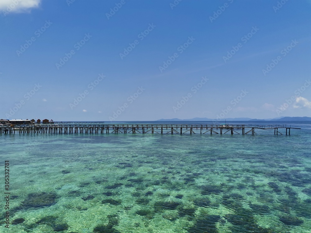 Beautiful sunny day and crystal clear water in Mabul Island, Semporna. Sabah, Malaysia. Borneo. The Land Below The Wind.