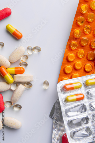 Collection colorful medication isolated on white background.