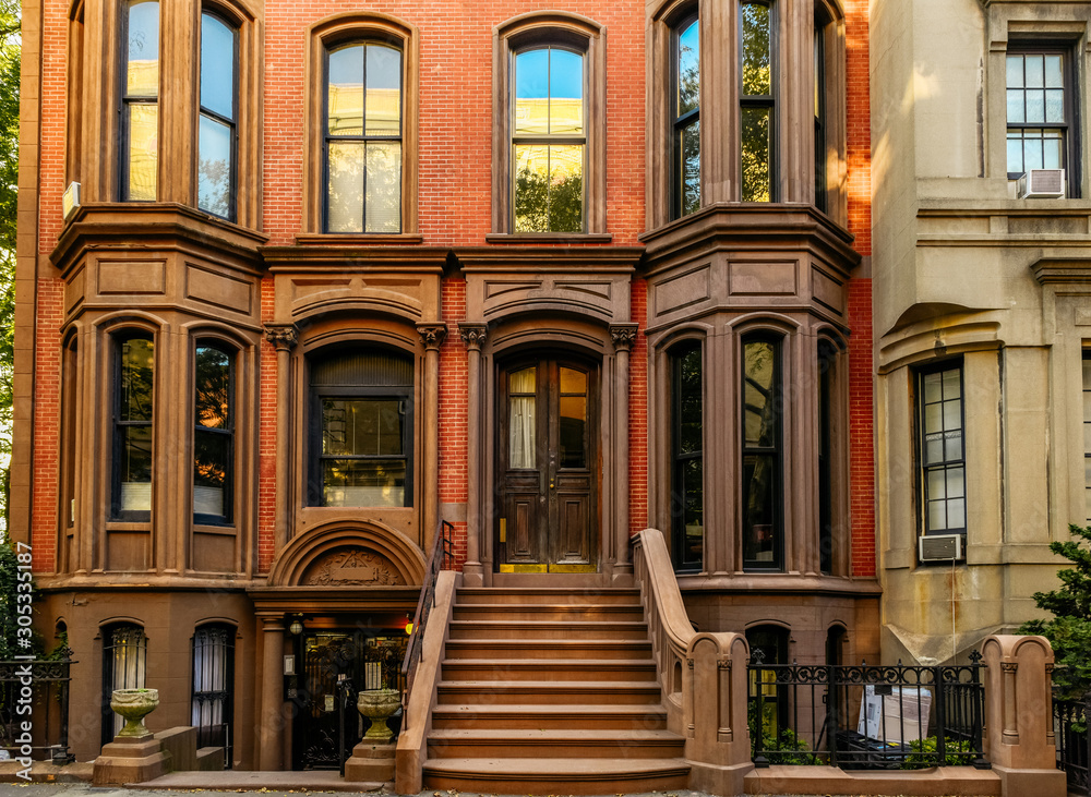 Brownstone facades & row houses at sunset in an iconic neighborhood of Brooklyn Heights in New York City Brownstone facades & row houses at sunset in an iconic neighborhood of Brooklyn Heights in New York City