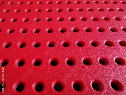 Perforated surface, abstrac...